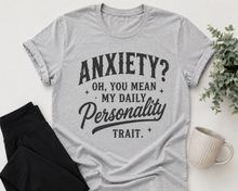 Load image into Gallery viewer, Gray graphic T-shirt with black vintage-style lettering reading Anxiety? Oh, You Mean My Daily Personality Trait.

