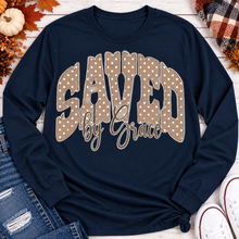 Load image into Gallery viewer, Saved by Grace faith graphic apparel with polka dot lettering, available in brown, navy and black V-neck, long sleeve, crewneck and hoodie styles.
