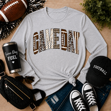 Load image into Gallery viewer, Julia Rose Game Day apparel featuring a football-inspired GAMEDAY graphic with leopard, polka-dot, gingham and striped details.
