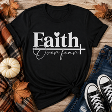 Load image into Gallery viewer, Julia Rose Faith Over Fear apparel featuring a white heart and cross design, available as a crewneck, V-neck, long-sleeve T-shirt and hoodie.
