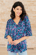 Load image into Gallery viewer, Dreamer Peplum Top in Navy and Lavender Animal Print
