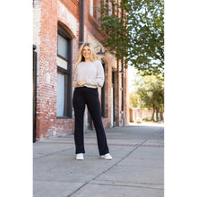 Load image into Gallery viewer, High-waisted black bootcut leggings by Julia Rose, Julia Rose women’s flared black leggings lifestyle image

