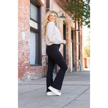 Load image into Gallery viewer, High-waisted black bootcut leggings by Julia Rose, Julia Rose women’s flared black leggings lifestyle image
