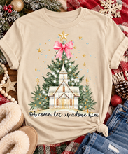 Load image into Gallery viewer, Oh Come Let Us Adore Him Christian Christmas graphic apparel with church, Christmas trees, stars and pink bow
