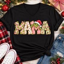Load image into Gallery viewer, Christmas MAMA graphic shirt featuring pink and green patterned lettering, colorful holiday lights, and a Grinch-inspired character wearing a Santa hat.
