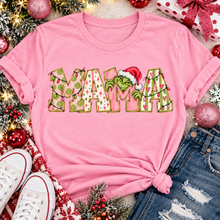 Load image into Gallery viewer, Christmas MAMA graphic shirt featuring pink and green patterned lettering, colorful holiday lights, and a Grinch-inspired character wearing a Santa hat.

