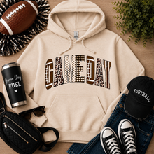 Load image into Gallery viewer, Julia Rose Game Day apparel featuring a football-inspired GAMEDAY graphic with leopard, polka-dot, gingham and striped details.
