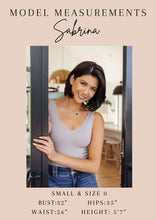 Load image into Gallery viewer, Dreamer Peplum Top in Navy and Lavender Animal Print
