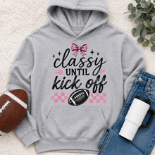 Load image into Gallery viewer, Classy Until Kick Off graphic hoodie with pink bow, football and pink checkerboard game day design
