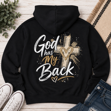 Load image into Gallery viewer, Back: Black God Has My Back hoodie with a large white and brown cross graphic and distressed faith-inspired design.
