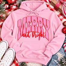Load image into Gallery viewer, Merry and Bright Christmas graphic apparel with oversized pink polka dot lettering and festive holiday design
