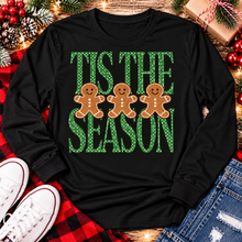 Load image into Gallery viewer, Tis the Season Christmas graphic apparel featuring green polka dot lettering and three gingerbread cookies
